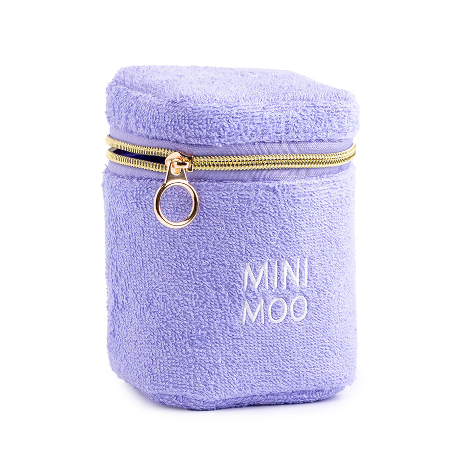 MooGoo Baby Mini Moo purple pouch with gold zipper on plain background, travel-size cosmetic bag for carrying baby skincare products, perfect for travel, storage and gifting