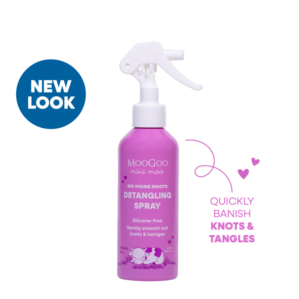 Purple Mini Moo Kids No More Knots detangling spray bottle with white nozzle on a white background. Quickly Banish knots & tangles. Gentle conditioning spray for kids that banishes knots and tangles. 