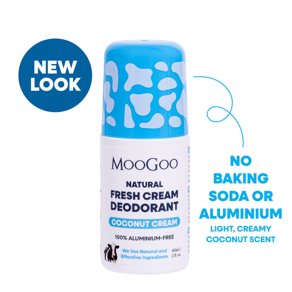 MooGoo Natural Fresh Cream Deodorant roll-on bottle in Coconut Cream scent, featuring a blue and white cow-print cap and white body. Includes a blue 'NEW LOOK' badge and marketing text on a white background. natural deodorant free from parabens, phenoxyethanol, baking soda and aluminium. 