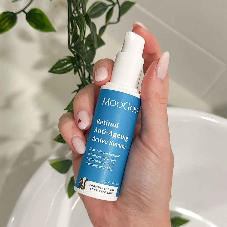 MooGoo Retinol Anti-Ageing Active Serum product in model’s hand, promoting smoother, brighter skin