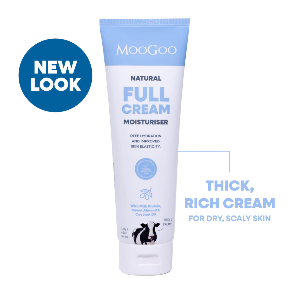 MooGoo Natural Full Cream Moisturiser in a white squeeze tube with light blue accents, shown on a white background with a blue 'NEW LOOK' badge. Everyday face and body cream to boost elasticity and hydrate sensitive skin. 