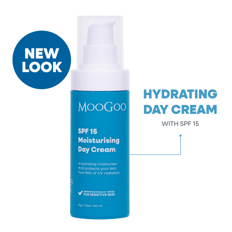MooGoo Hydrating Day Cream SPF 15 in a blue and white pump bottle, shown on a white background. Hydrating face cream with zinc oxide, niacinamide and antioxidants to protect against UV damage.