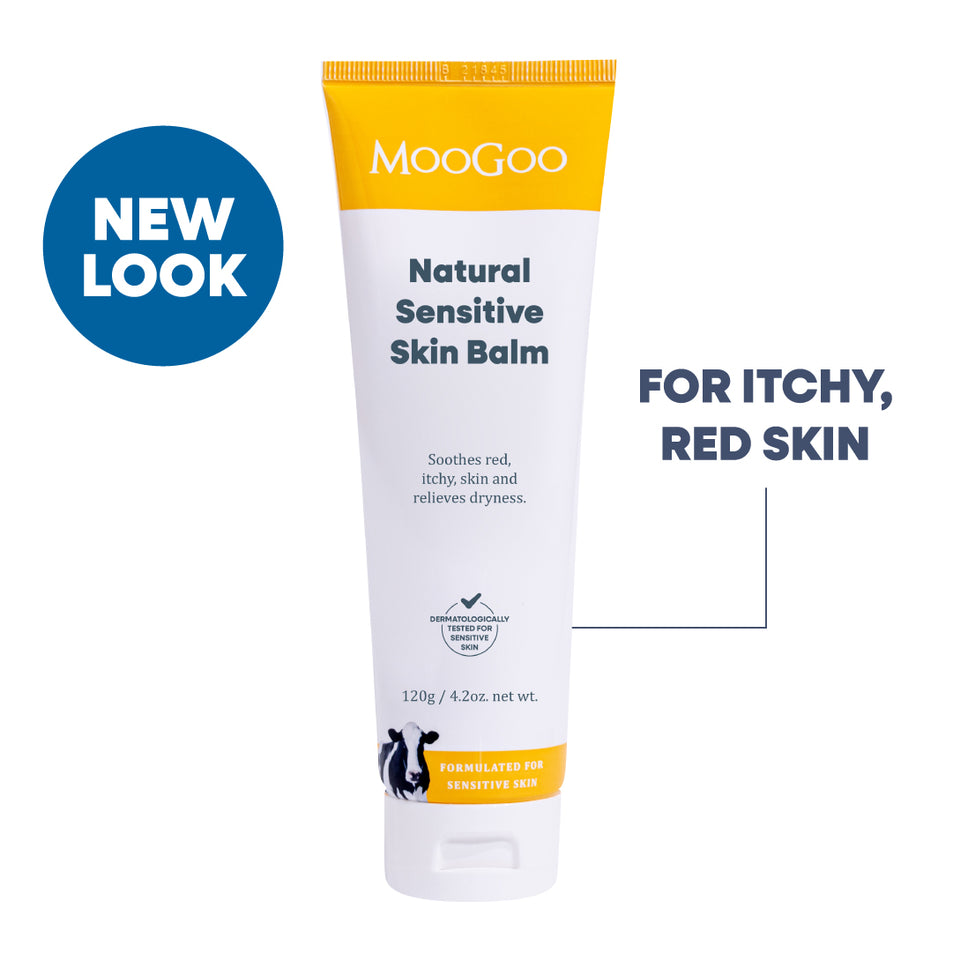 MooGoo Natural Sensitive Skin Balm in a white squeeze tube with yellow accents, shown on a white background with promotional text 'NEW LOOK' and 'FOR ITCHY, RED SKIN'. Gentle cream for red itchy irritated skin. 