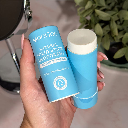 MooGoo Natural Solid Stick Deodorant Coconut Cream held open in recyclable tube, aluminium free deodorant for odour protection