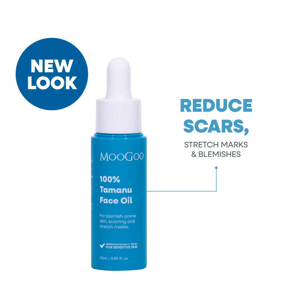 MooGoo 100% Tamanu Face Oil in a blue bottle with a white dropper cap, shown on a white background, reduces scars, stretch marks and blemishes.